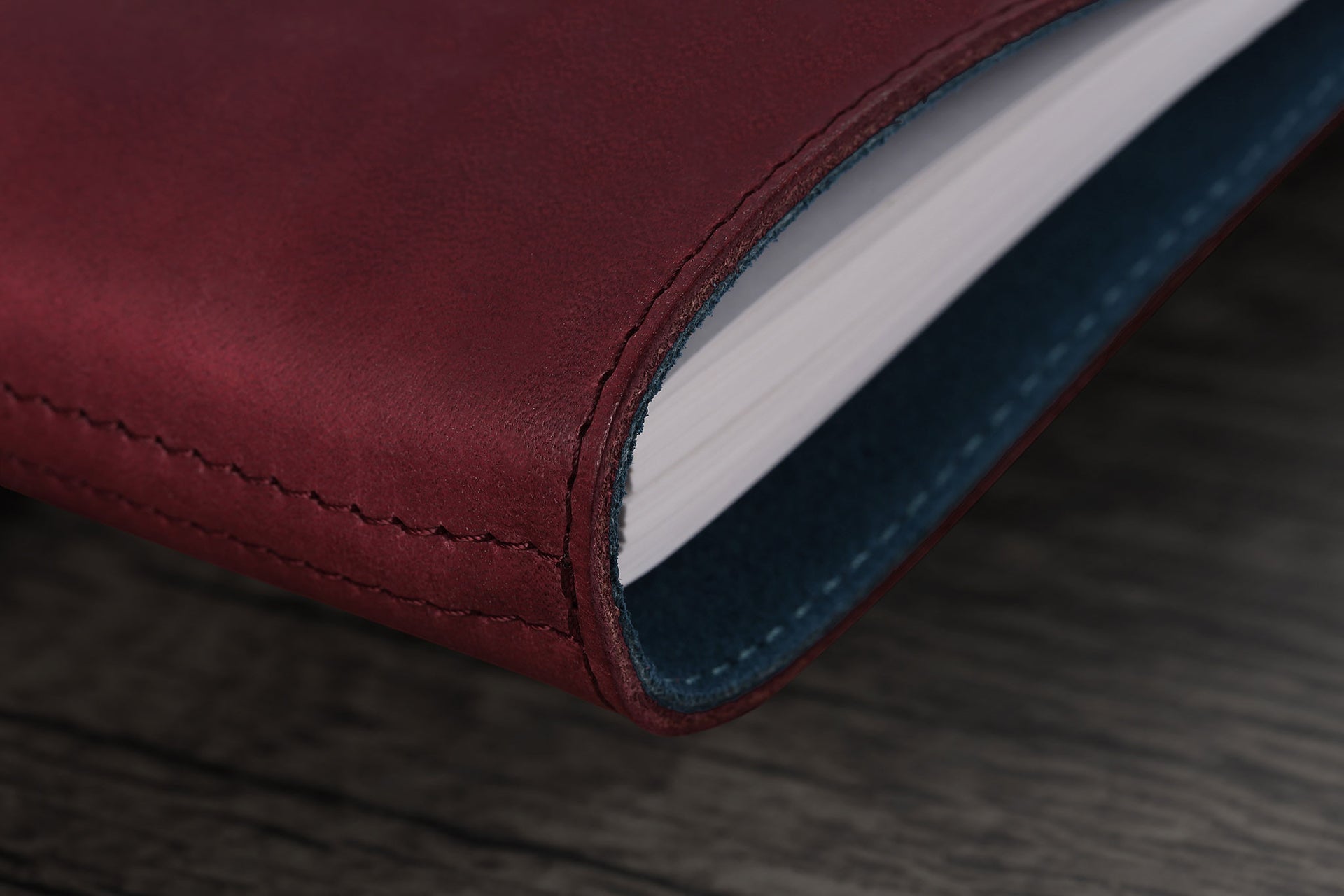 William Hannah bordeaux leather and blue suede A6 notebook: spine detail