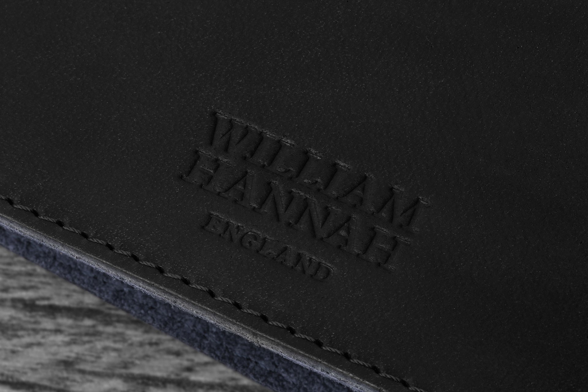 William Hannah black leather and navy suede A6 notebook: cover logo