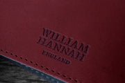 William Hannah bordeaux leather and blue suede A6 notebook: cover logo