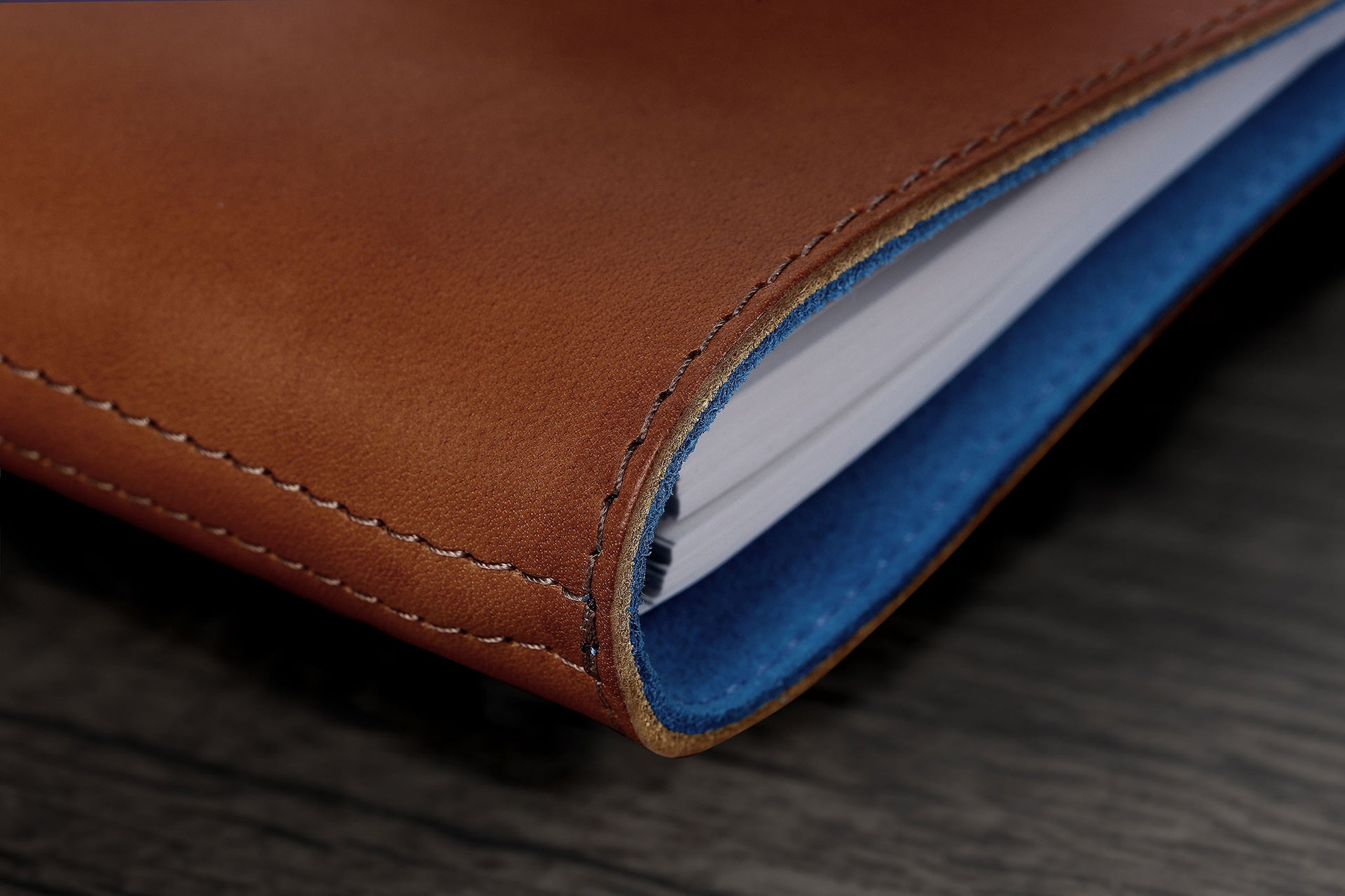 William Hannah tan leather and light blue suede A6 notebook: spine detail