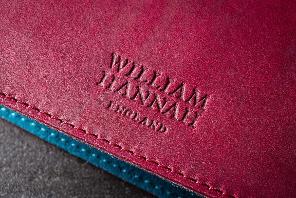William Hannah Bordeaux leather and Blue suede A5 notebook: cover logo