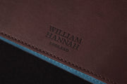 William Hannah Dark Brown leather and Blue suede A5 notebook: cover logo