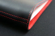 William Hannah black leather and red suede A6 notebook: spine detail