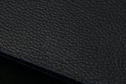 William Hannah Black leather and Navy suede A5 notebook: leather texture and cover logo