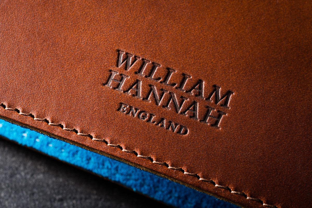 William Hannah Tan leather and Blue suede A5 notebook: cover logo